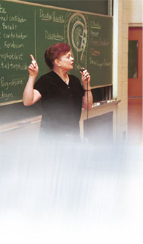 Image of Teacher in front of classroom