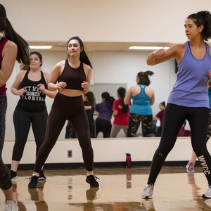 People working out in the group fitness room 