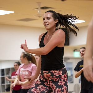 Students in a Hip Hop Zumba group fitness session at the IBC Student Rec Center.