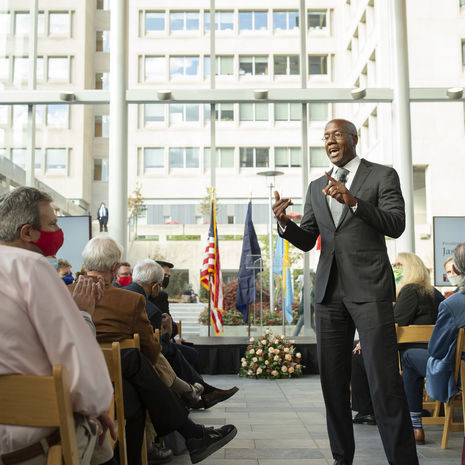 President Wingard speaks in front of a seated crowd.