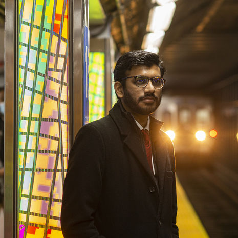Sarvesh Shah standing on the train platform in Philadelphia