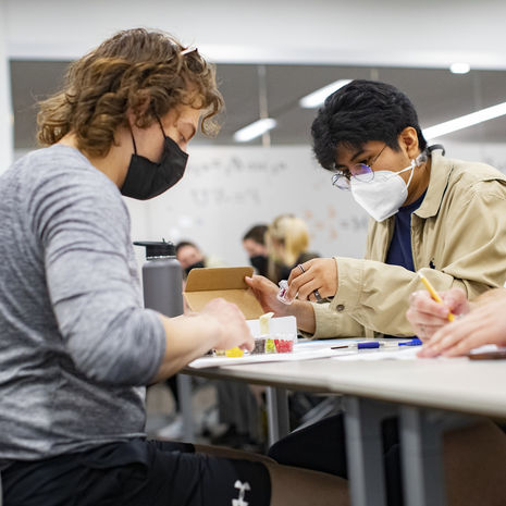 three Klein students collaborating in class.