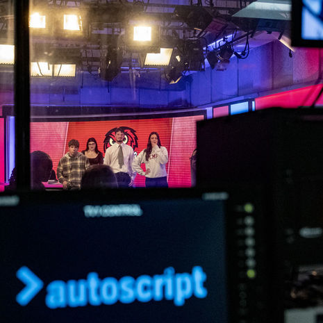 Image of Temple students in the Owl Update studio.