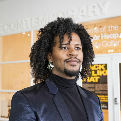 Image of Matthew Jordan-Miller Kenyatta in front of Temple Contemporary.