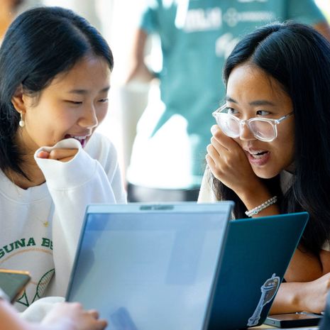 Image of students working at OwlHacks.