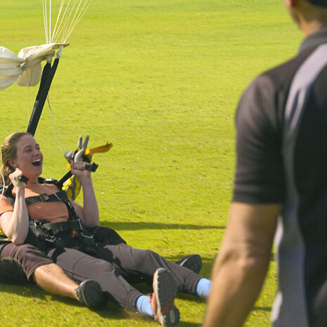 Image of Alyssa Borden    skydiving in Dubai on The Amazing Race 37.