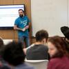 Professor teaches Temple students in CST classroom.