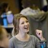 An occupational therapy student laughs during class.