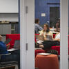 art students study together in a room.