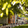 an image of students walking across main campus