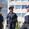three Temple safety professionals talking.