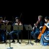Temple Boyer students perform in a chamber orchestra.