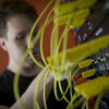 Electrical engineering student working with wiring