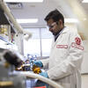 Environmental Engineering PhD student in a lab