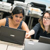 Health informatics students collaborating in class