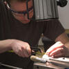 Mechanical engineering graduate student in a lab