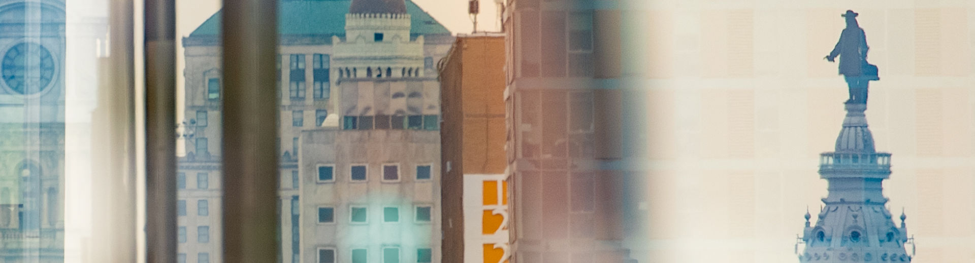 An abstract, layered image of the Philadelphia skyline