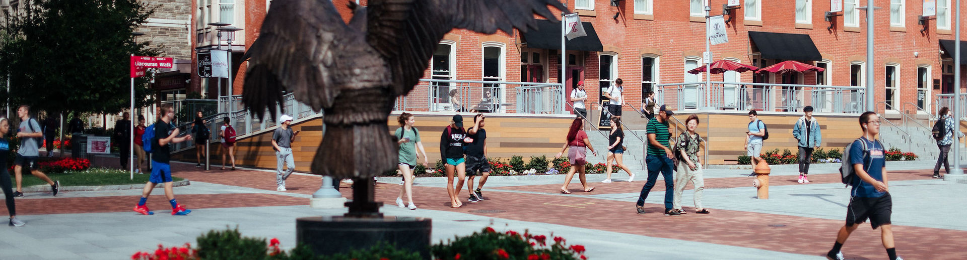 Students on Liacouras Walk on a sunny day.