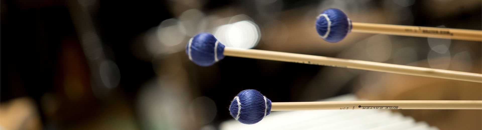 Mallets striking.