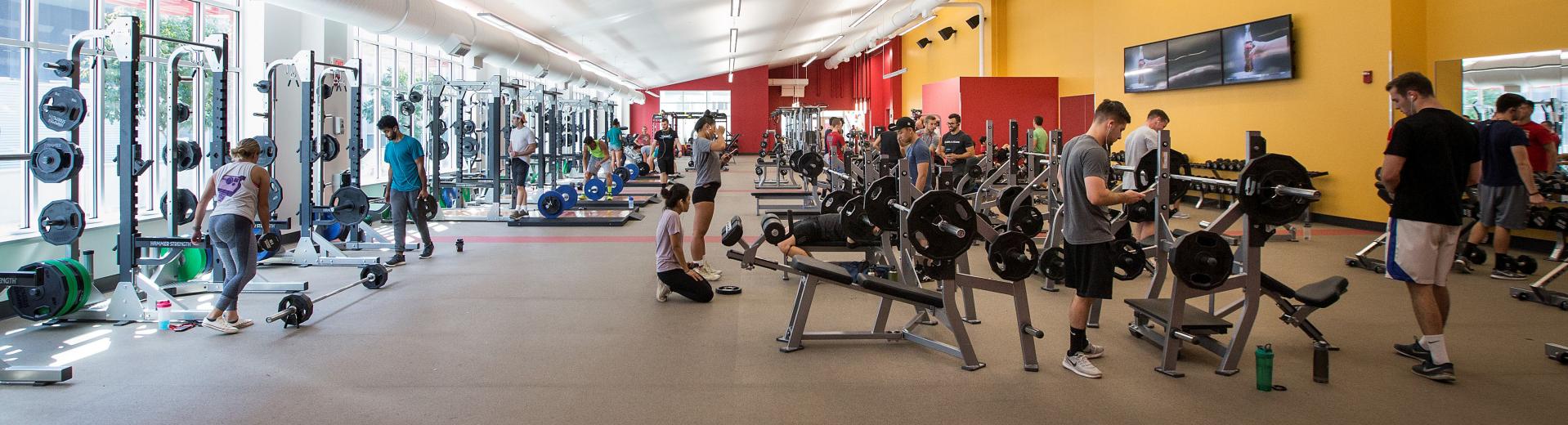 student athletes working out in a gym 