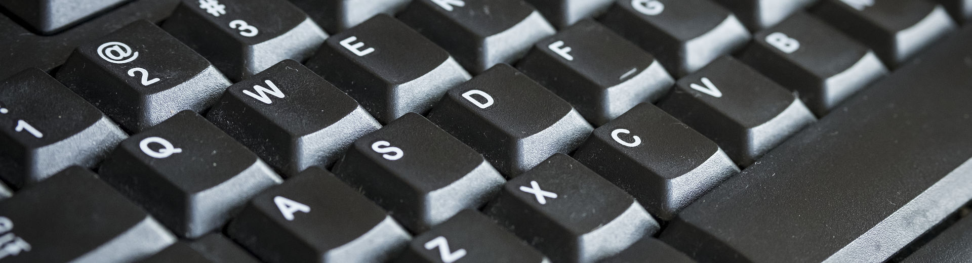 A close-up black computer keyboard.