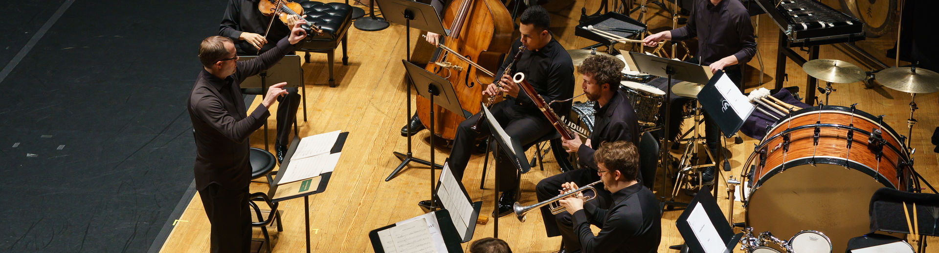 Students playing a concert on stage 