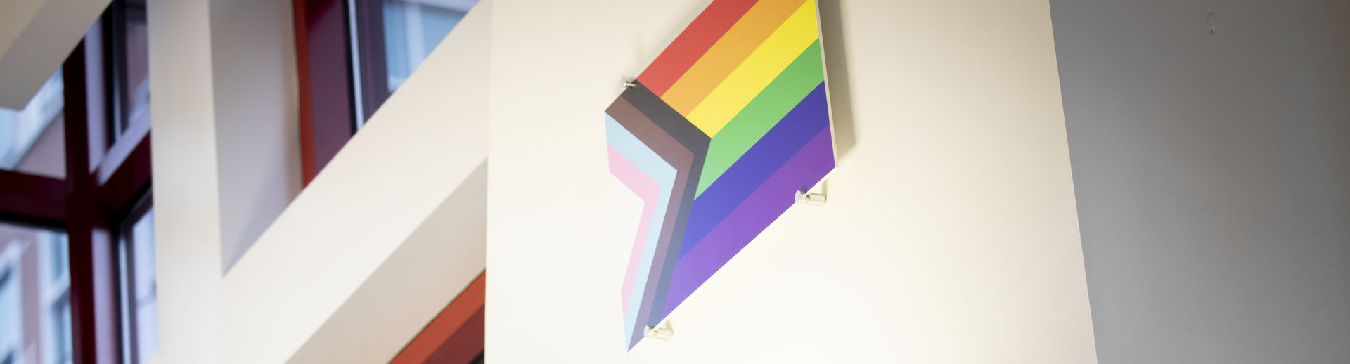 The pride flag hangs in the student center of Temple University.