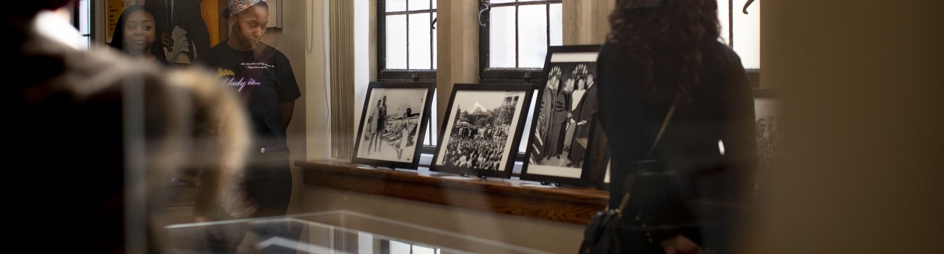 Students view a collection at the Charles Blockson Collection on campus.