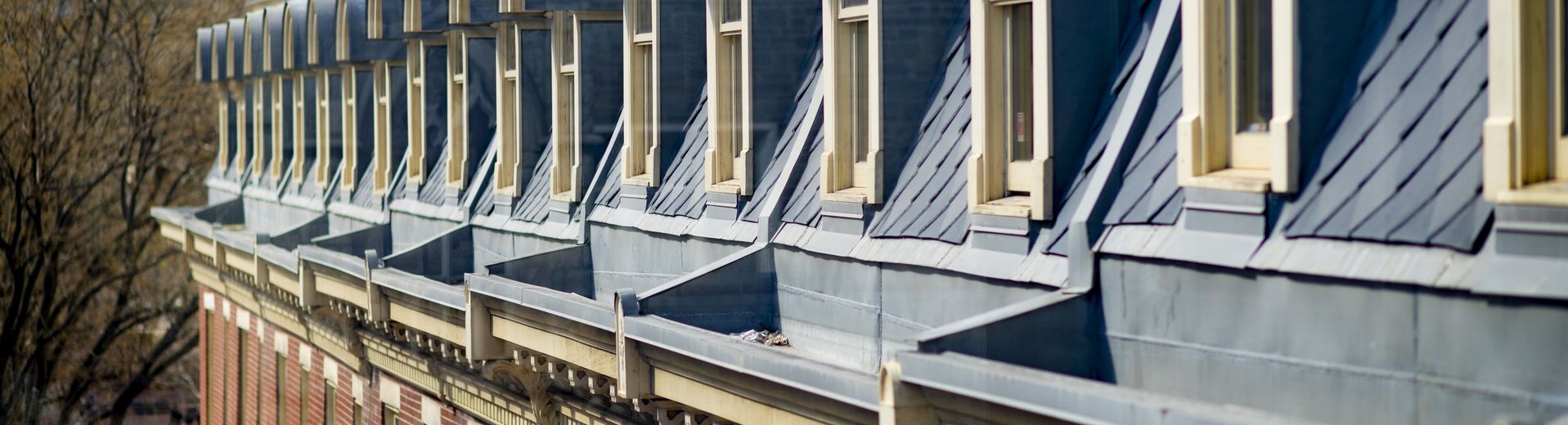 Dormers on a colonial-style building on Temple University Main Campus.