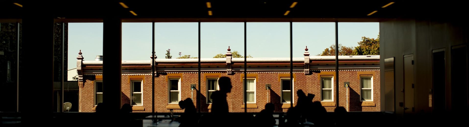 abstract image of students studying in Charles Library.
