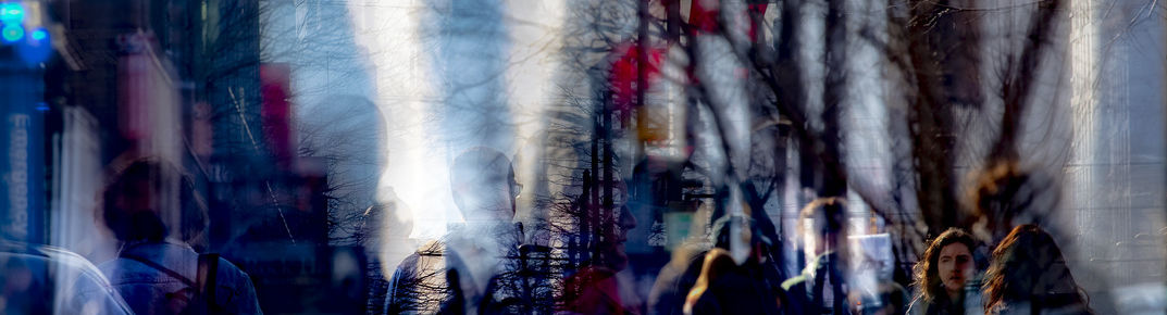 A multiple exposure shot of students on Temple's campus.