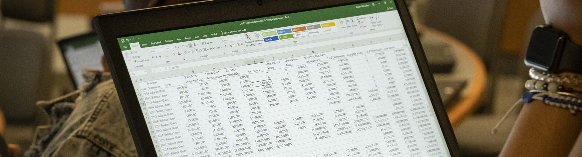 accounting spreadsheet on a laptop.