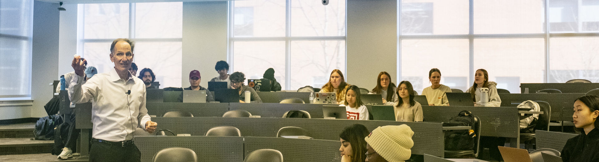 Fox professor instructs a classroom of students.