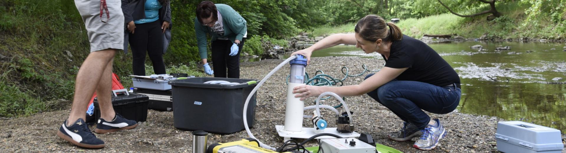 Environmental health class testing river water