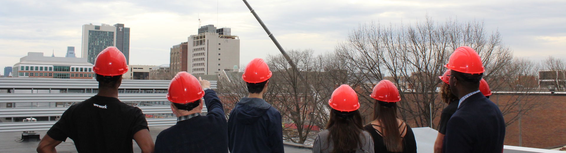 facilities management students observing construction.