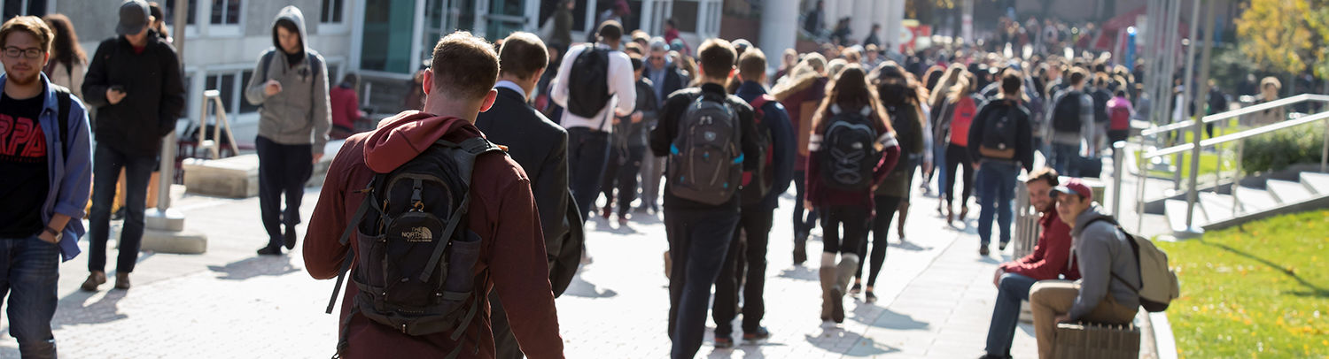 Students between classes walking on Liacouras Walk