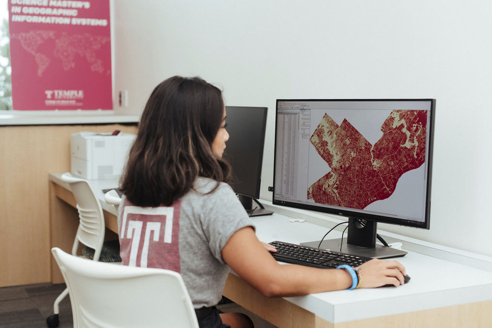 A student works on a mapping project in the GIS studio.