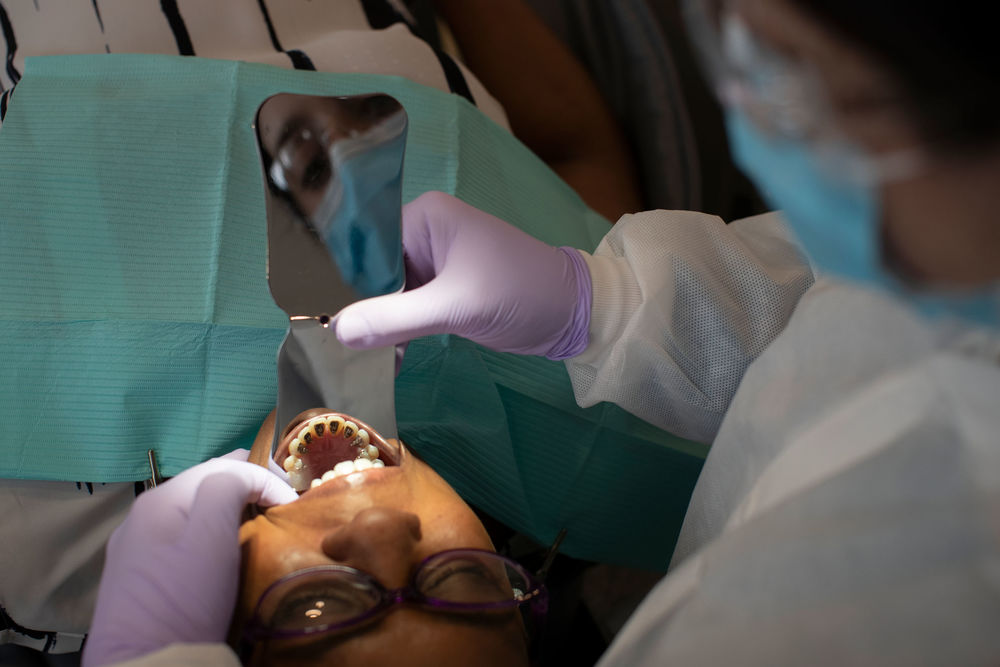 An orthodontics patient being treated in a clinic at Temple Dental.