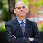 headshot of Alex Diaz, Temple's chief compliance officer