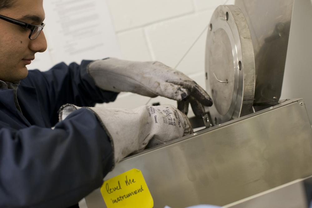 Civil Engineering graduate student working in a lab