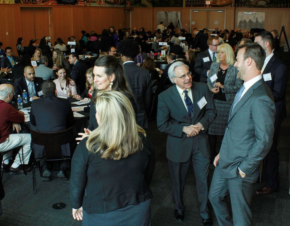 Temple Human Resource Management faculty mingle at an annual awards ceremony.