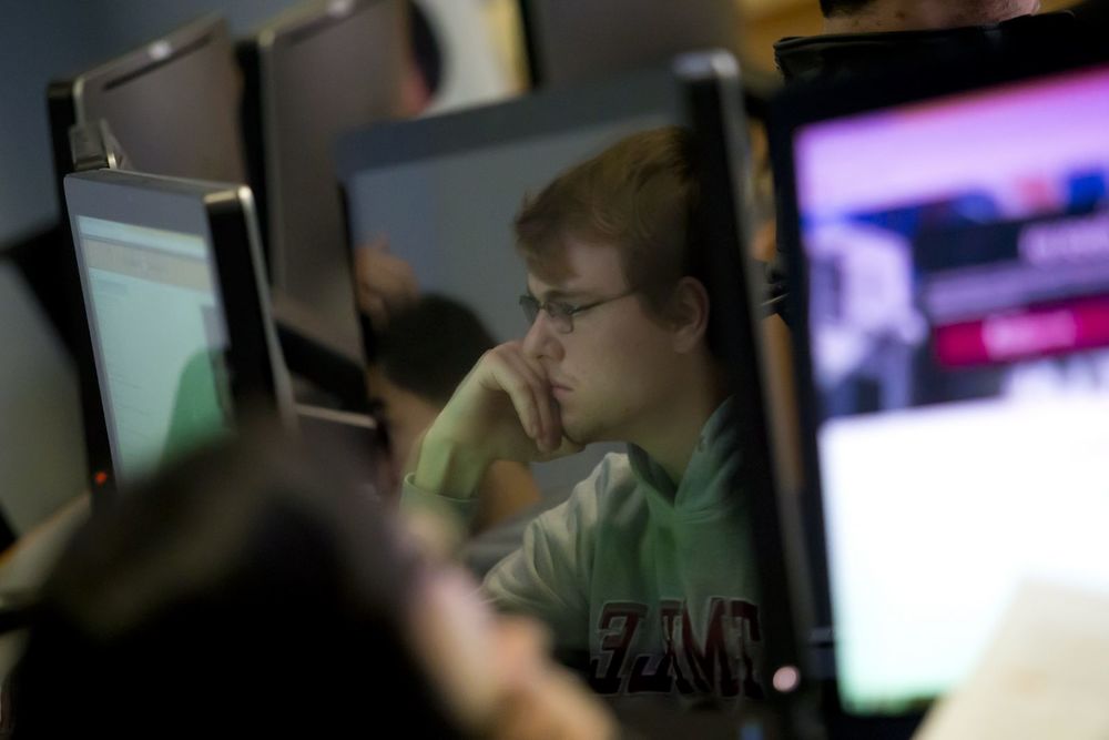 Fox School of Business students work diligently in the computer lab.