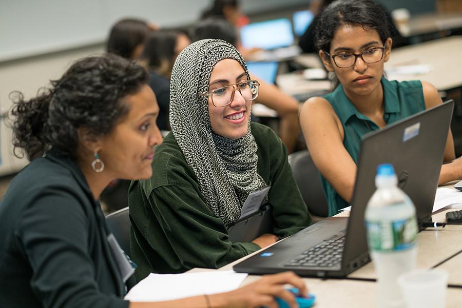 health information management students working together in class