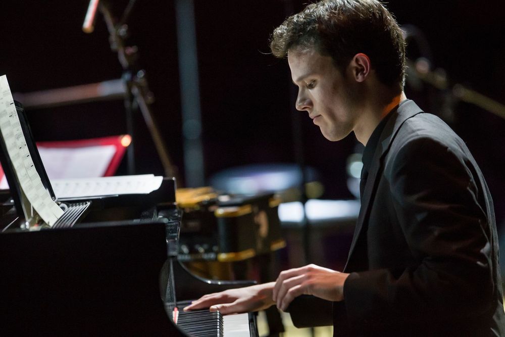 A student playing piano during a Boyer College of Music and Dance performance.