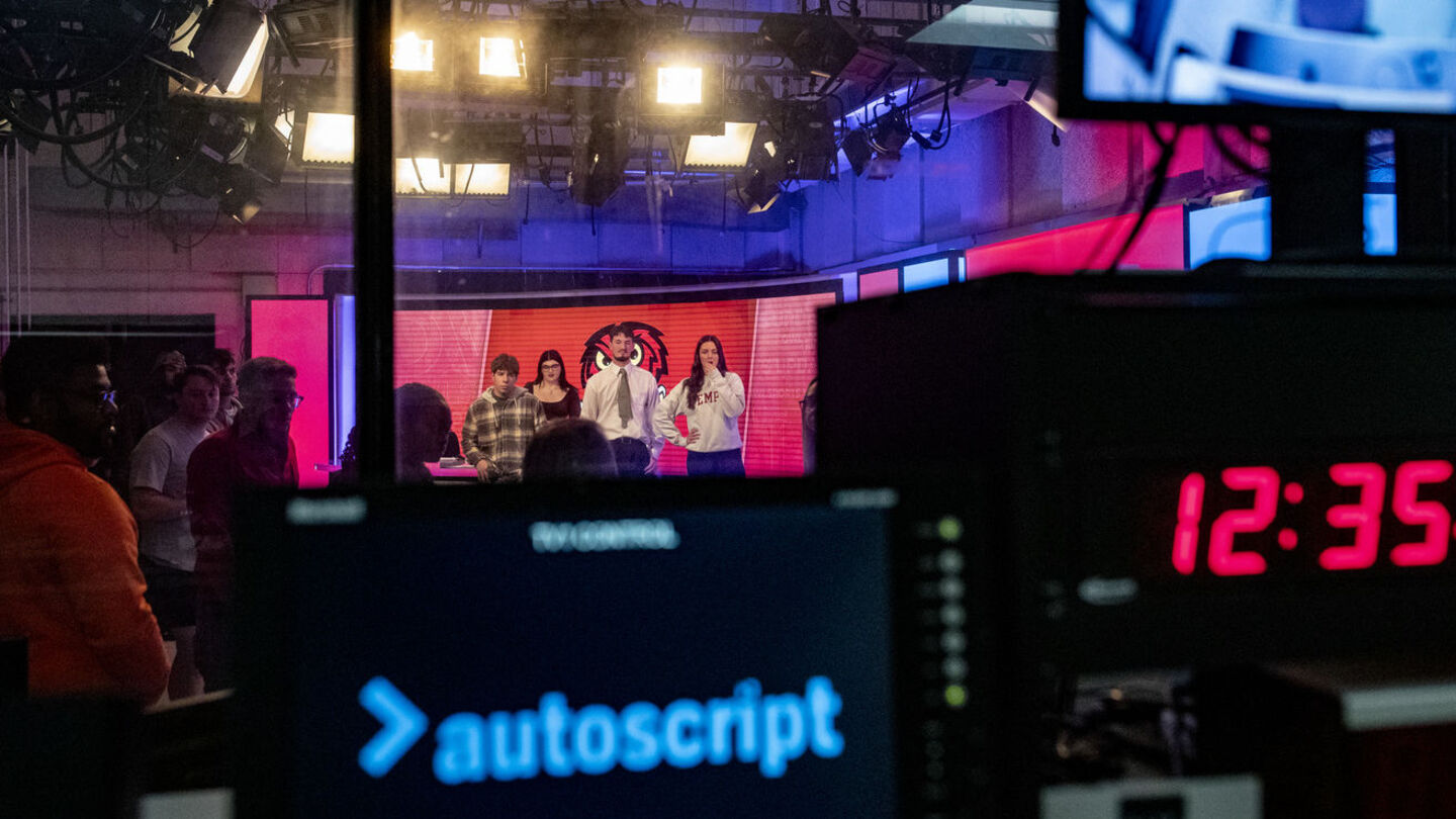 Image of Temple students in the Owl Update studio.